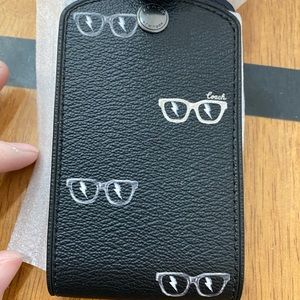 Coach sunglasses luggage tag